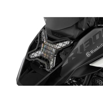 Grille de protection amovible pour phares LED de BMW R1300GS. Blackpines.fr
